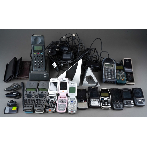 495 - A box containing a collection of various cordless and mobile telephones, including Samsung, NEC, Cel... 