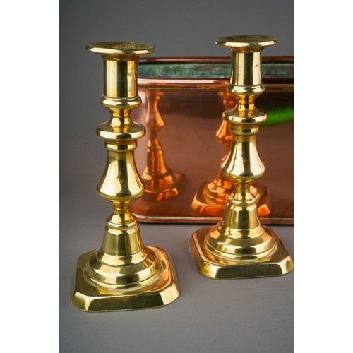 514 - A pair of Victorian brass candlesticks, height 17cm and a 20th century rectangular copper planter, l... 