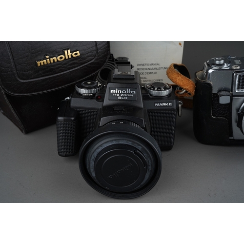 515 - Two cased film cameras, comprising a Minolta 110 Zoom SLR, with Minolta Zoom Rokkor-Macro 25-67mm 1:... 