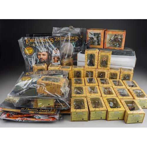 525 - A collection of Lord of the Rings Collectors Models magazines and boxed figures and display stands, ... 