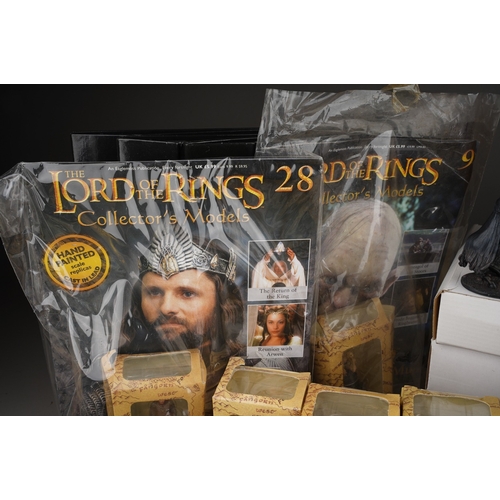 525 - A collection of Lord of the Rings Collectors Models magazines and boxed figures and display stands, ... 