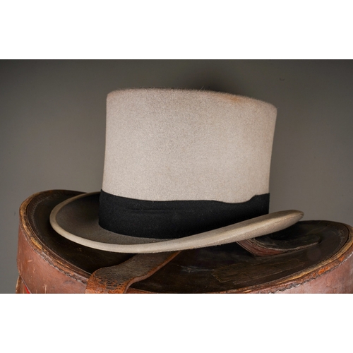 530 - Three vintage top hats to include: 

1. Henry Heath of Oxford Street circa 1930s moleskin black top ... 