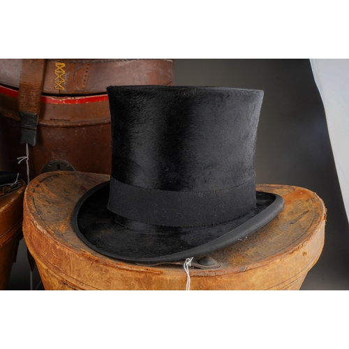 530 - Three vintage top hats to include: 

1. Henry Heath of Oxford Street circa 1930s moleskin black top ... 