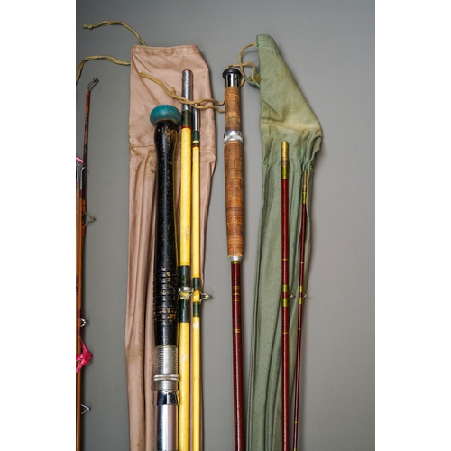 536 - Four various early 20th Century fly fishing rods, two in slip cases (4) -af