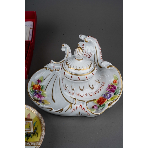 561 - A collection of 18th Century style Dresden porcelain, in the Rococo manner to include; a pair of can... 