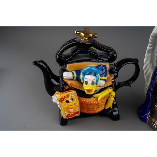 567 - Two Paul Cardew limited edition Disney Character Collection teapots, 