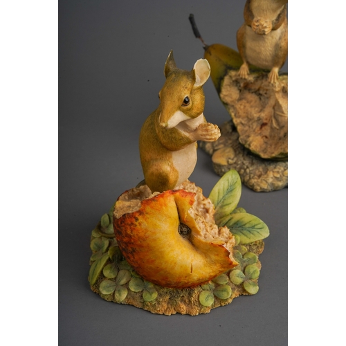 570 - A collection of four Border Fine Art mice eating fruit signed Ayre (4)