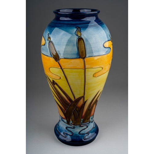 571 - A Moorcroft Bull Rushes Vase, impressed mark to underside and signed with initials, approx 31cm high