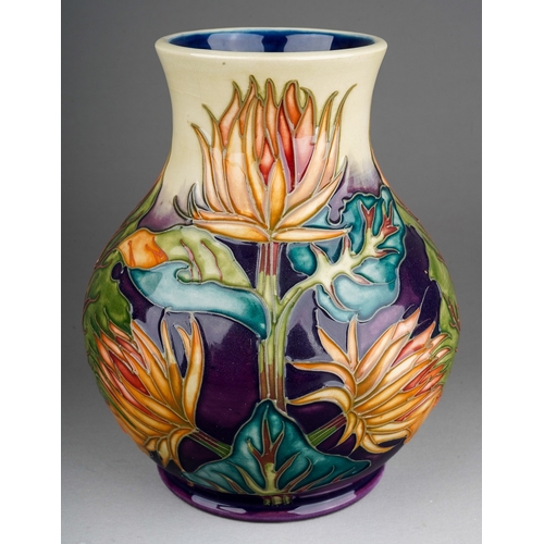 584 - A boxed Moorcroft squat baluster vase decorated in the Burdock design, circa 1999, painted and impre... 