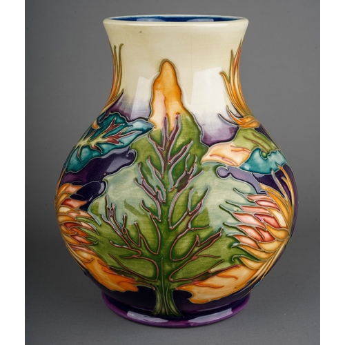 584 - A boxed Moorcroft squat baluster vase decorated in the Burdock design, circa 1999, painted and impre... 