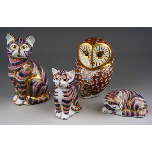 586 - Three Royal Crown Derby blue stripped Tabby cat paperweights, red backstamps, two with gilt stoppers... 