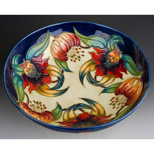 587 - A boxed Moorcroft Anna Lily pattern footed bowl, designed by Nicola Slaney, circa 1998, printed, pai... 