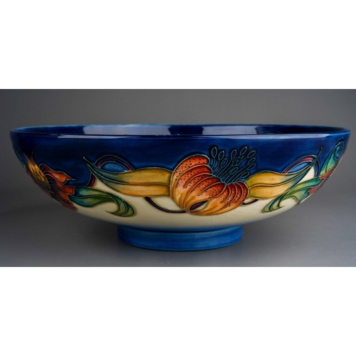 587 - A boxed Moorcroft Anna Lily pattern footed bowl, designed by Nicola Slaney, circa 1998, printed, pai... 