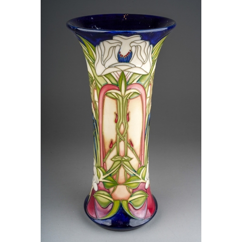 588 - A boxed Moorcroft limited edition Fountains Abbey pattern flared rim conical vase, designed by Phili... 