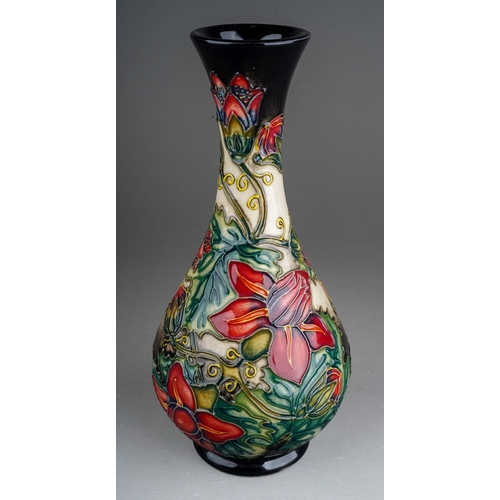 590 - A boxed Moorcroft pottery baluster vase in trial Palamata design, by Shirley Hayes, dated 12.4.99 to... 