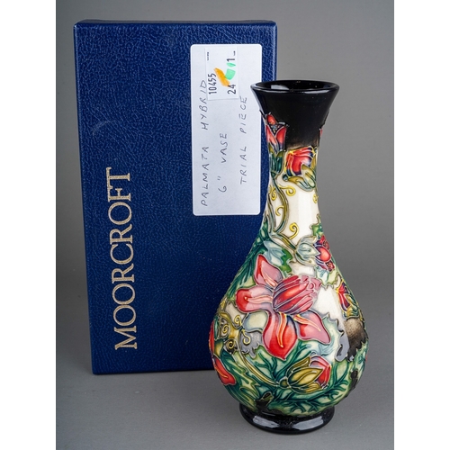 590 - A boxed Moorcroft pottery baluster vase in trial Palamata design, by Shirley Hayes, dated 12.4.99 to... 