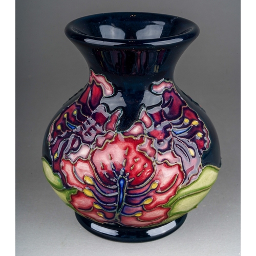 592 - A boxed Moorcroft pottery squat baluster vase in the Spider Flower design, by Rachel Bishop, possibl... 