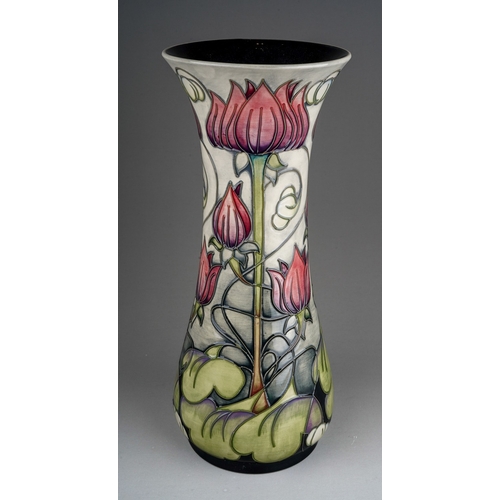 594 - A boxed Moorcroft pottery baluster vase in the trial Appledorn design by Emma Bossons, base inscribe... 