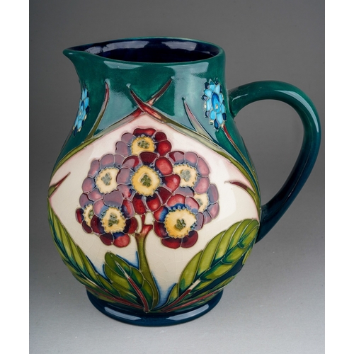 601 - A Moorcroft pottery limited edition baluster jug decorated in the Springtime at Home design by Phili... 