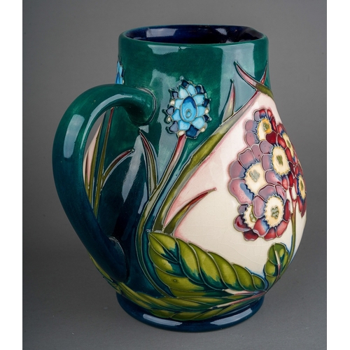 601 - A Moorcroft pottery limited edition baluster jug decorated in the Springtime at Home design by Phili... 