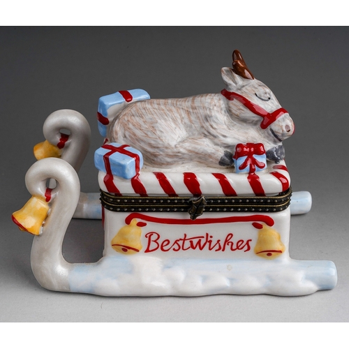 613 - A Villeroy & Boch porcelain Christmas trinket box, modelled as Rudolph the reindeer sleeping on top ... 