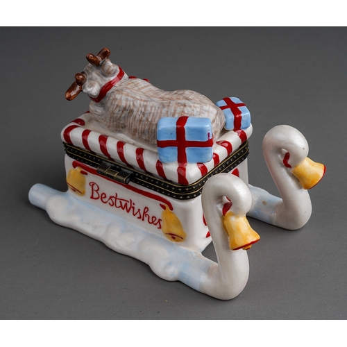 613 - A Villeroy & Boch porcelain Christmas trinket box, modelled as Rudolph the reindeer sleeping on top ... 