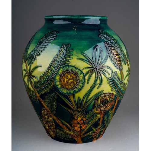 615 - A boxed Moorcroft pottery limited edition baluster vase decorated in the Amazon Twilight design, cir... 