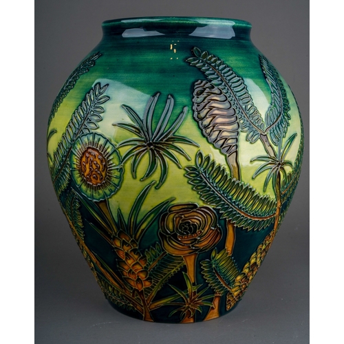 615 - A boxed Moorcroft pottery limited edition baluster vase decorated in the Amazon Twilight design, cir... 