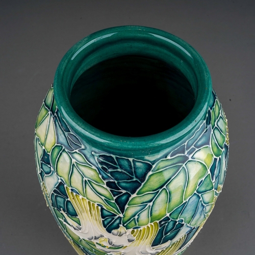 616 - A Moorcroft pottery Collectors Club baluster vase decorated in Angels Trumpets design by Anji Davenp... 