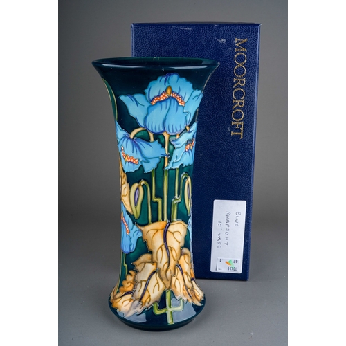 617 - A boxed Moorcroft pottery Collectors Club conical flared rim vase decorated in the Blue Rhapsody des... 