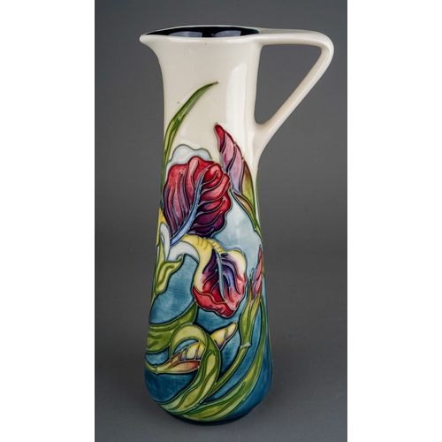 618 - A boxed Moorcroft Collectors Club conical jug decorated in an Iris design by Rachel Bishop, circa 19... 