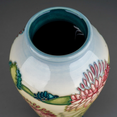 621 - A boxed Moorcroft pottery limited edition inverted baluster vase in the Cleome design by Sian Leeper... 