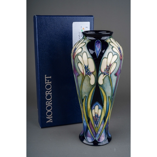 623 - A boxed Moorcroft pottery Collectors Club limited edition inverted baluster vase decorated in the At... 