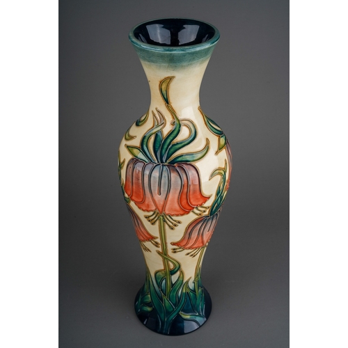 625 - A boxed Moorcroft pottery limited edition slender baluster vase in the Crown Imperial design by Rach... 