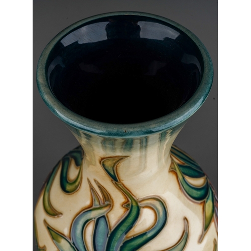 625 - A boxed Moorcroft pottery limited edition slender baluster vase in the Crown Imperial design by Rach... 