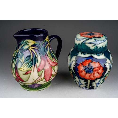 628 - Two pieces of Moorcroft pottery, comprising a Collectors Club limited edition jug in a Fuchsia desig... 