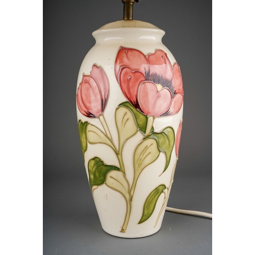 632 - A Moorcroft for St. Michael (M&S) baluster table lamp decorated in a Magnolia design on an ivory gro... 