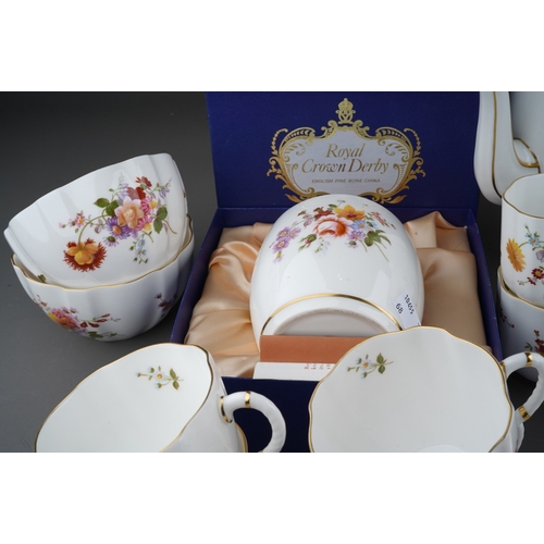 634 - A collection of Royal Crown Derby 'Derby Posies' pattern tea, coffee and dinnerware, etc, comprising... 