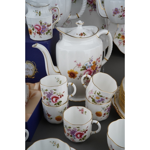 634 - A collection of Royal Crown Derby 'Derby Posies' pattern tea, coffee and dinnerware, etc, comprising... 