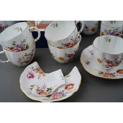 634 - A collection of Royal Crown Derby 'Derby Posies' pattern tea, coffee and dinnerware, etc, comprising... 