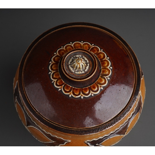 635 - A Royal Doulton tobacco jar and cover, applied with monks in various poses, incised marks to undersi... 