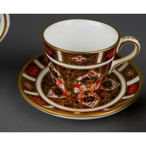 637 - A boxed Royal Crown Derby Imari 1128 pattern miniature five piece tea set and oval tray, the tea set... 