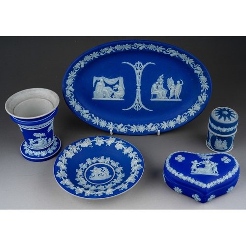 640 - Five Wedgwood blue jasparware items to include; oval dish, heart shaped ring box and cover; a posy v... 