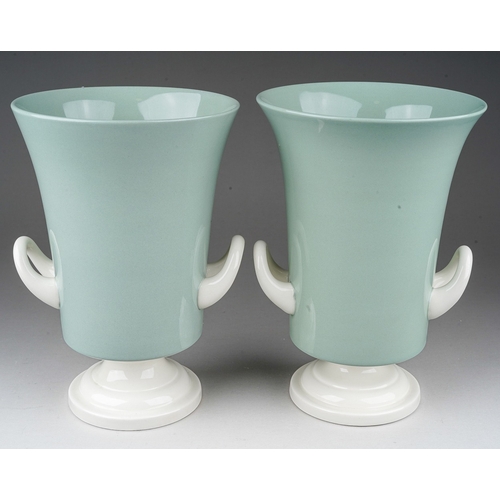 641 - A pair of Keith Murray for Wedgwood  & Barlaston two handled vases, approx 21cm high (2)