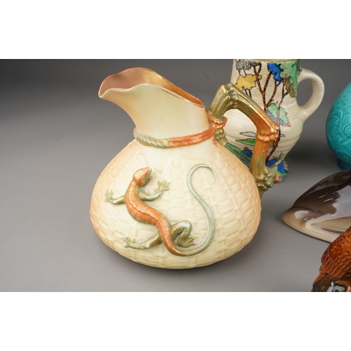 650 - A Royal Worcester blush ivory basket weave jug with relief moulded lizard, shape no.1714, height 14c... 