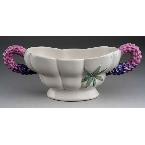 655 - A Clarice Cliff Royal Staffordshire Lupin pattern two handled planter, purple handles with green lea... 