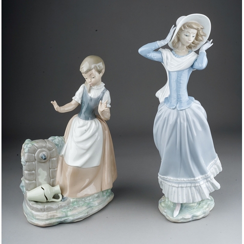 658 - A Lladro figure of lady 