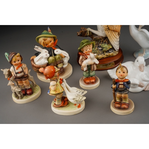 659 - A small collection of Hummel, Royal Doulton and Lladro , comprising five Hummel figures of children,... 