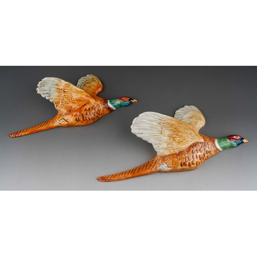 664 - Two Beswick graduating Pheasant wall plaques, factory stamps, impressed numbers 661-1 and 661-2 (2)