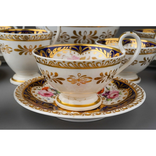 669 - An early 19th Century part tea set to include: five teacups, two coffee cups, five saucers and slope... 